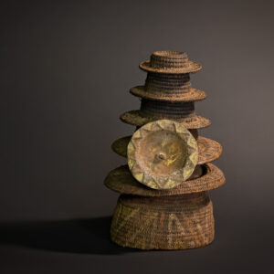 "Radiant Compact: Ekonda Botolo Hat with Seven Tiers and Sunburst Prestige Disc"